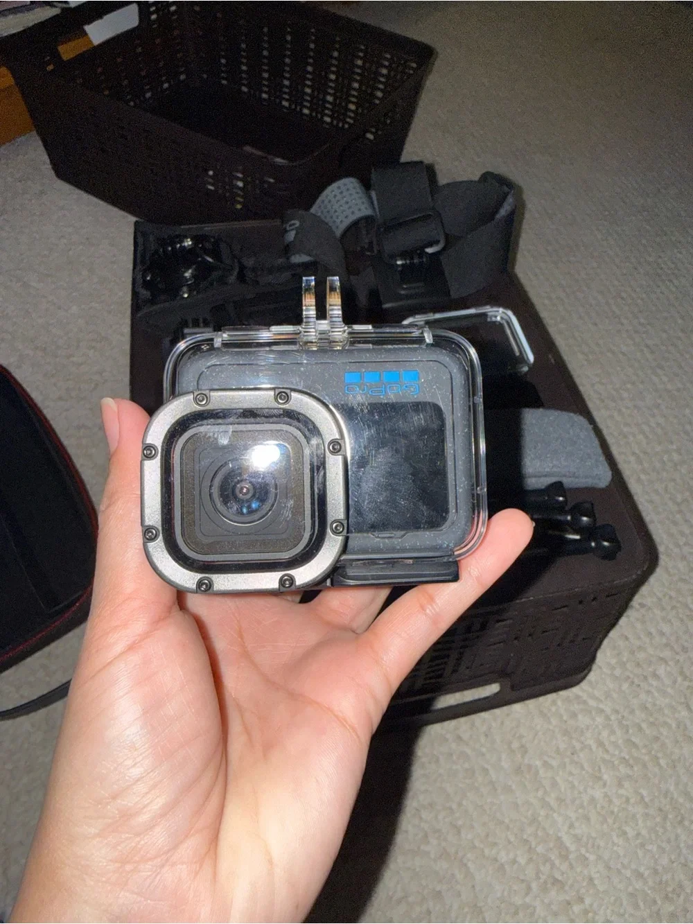 GoPro Accessory Set with Black Mounts and Orange-Tipped Floating Handle